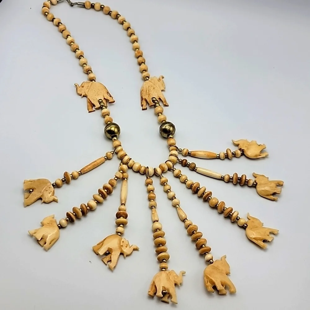 VTG Statement Tribal Bone Bovine Elephant Charm Beaded Gold Tone Necklace Ethnic